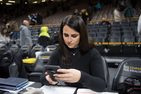 Jen Fisher using mobile phones