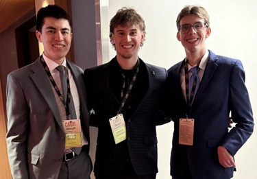 Three students at Cleveland event.