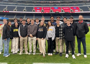 Students on Soldier Field pitch