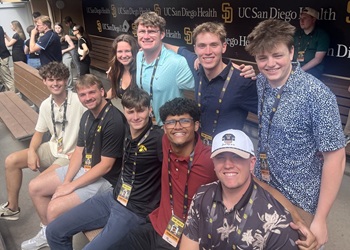 Students in San Diego Padres dugout