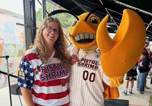 Ella Raef with shrimp mascot