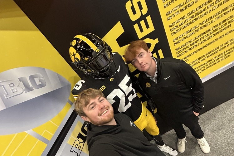 Owen Parker and Matthew Pinion at Hawkeye exhibit in fan fest