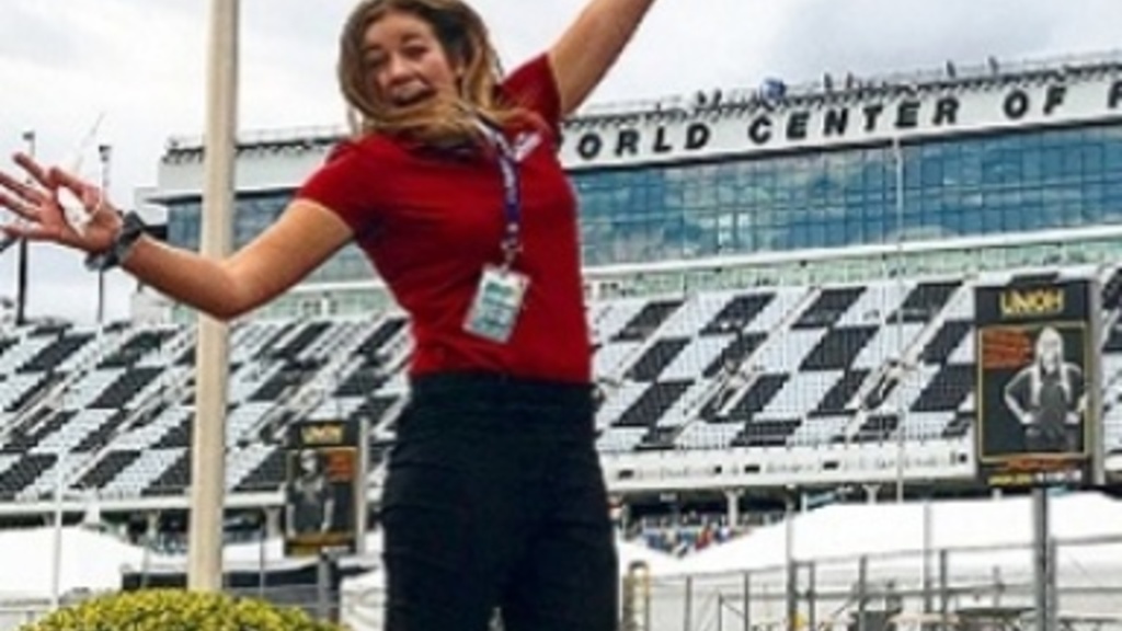 Hannah Conlisk jumping in the air.